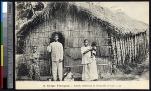 Indigenous Christian family in front of their house, Brazzaville, Congo Republic, ca.1900-1930