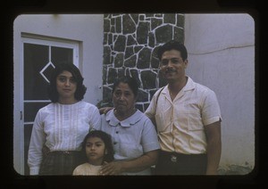 Family outside their home