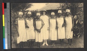 Missionary sister flanked by nurses, Congo, ca.1920-1940