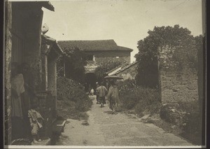 Leute zum Markt gehend in Honyen