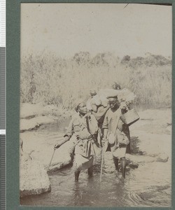 Stretchered across a river, Zambezia province, Mozambique, 23-29 July 1918