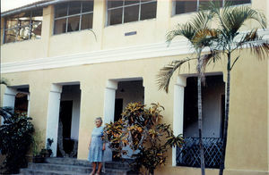 East Jeypore, Orissa, India. Missionary Kæthe Andersen in front of her bungalow, Gunupur. A mar