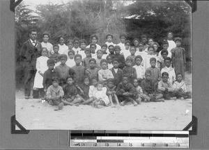 Teacher with a group of students, Port Elizabeth, South Africa