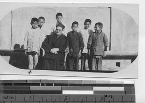 Maryknoll priest with Latin class at Hong Kong, China, 1922