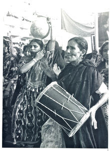 Arab dancers from upcountry (Bedouins), parading and celebrating the 5th anniversary of British