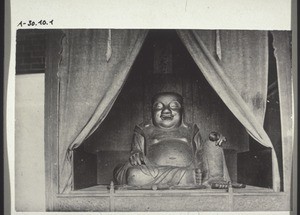 Chinese deity: a smiling Buddha