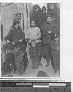 Maryknoll Sisters with Chinese family at Dalian, China, 1936