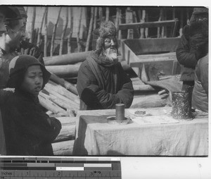 A fortune teller at Fushun, China