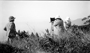 Photographer shooting landscape, Tanzania, ca.1893-1920