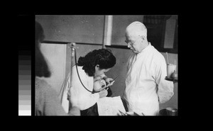 Dr. Edna Wei treating a patient, Chengdu, Sichuan, China, ca.1946