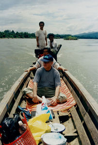 On The Mekong River. Laos is seen in the background. 2001