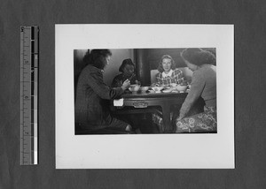 Ruth Wick in the dining room at Yenching University, Beijing, China, ca. 1938