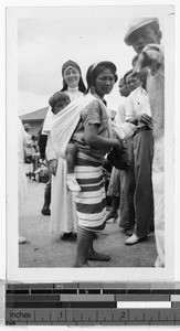 Maryknoll Sr. Celeste with indigenous people in a Baguio market, Philippines, April 6, 1935