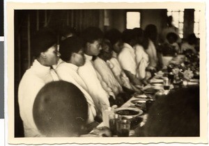 Women sitting on a table, Ayra, Ethiopia, 1952