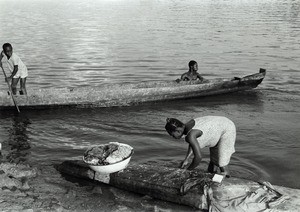 Woman doing her washing in the Ogooue river, in Gabon