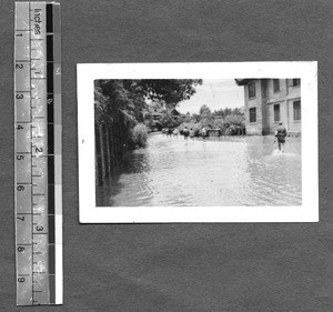 Flood covering road near West China Union University, Chengdu, Sichuan, China, 1947