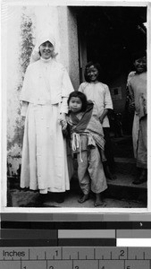 Maryknoll Sister with children, Kaying, China, 1939