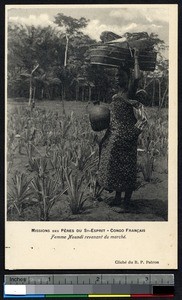 Noundi woman returns from the market, Congo Republic, ca.1900-1930