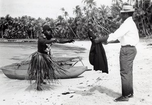 Historical reconstitution of the arrival of Fao, an evangelist, on Lifou in 1842 : Fao offering his jacket to a native