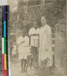 Dorthea Rugset together with two Malagasy schoolboys, Madagascar, ca.1927