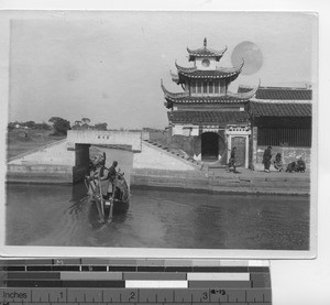 A temple on the water in China, 1920