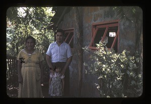 Family outside their home