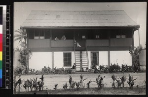 Missionary party on verandah of misison house, Nigeria, 1932