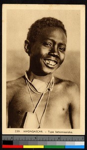 Bust portrait of a smiling young man, Madagascar, ca.1920-1940