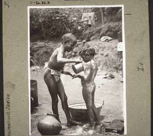 Twobrothers taking a bath. 1930