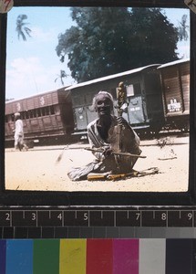 Blind musician at Mandalay railway station, Myanmar, s.d