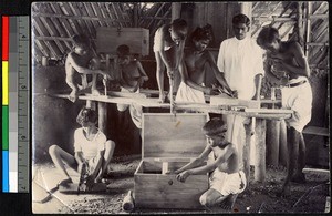 Young men working in a carpentry shop, India, ca.1919-1943