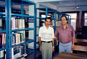 Dr. Ramesh Khatry (right) with the librarian at ATEN: Association of Theological Education in N