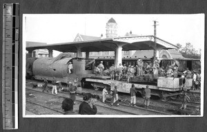 Soldiers working on a train, Jinan, Shandong, China, 1928