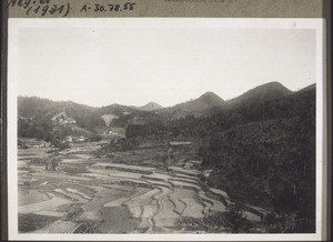 Five mountain peaks are the landmarks in the valley of Nyenhang (in the background of the picture the mission station)