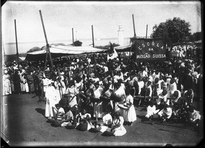 Swiss missionaries and African people in a street, Maputo, Mozambique, ca. 1890-1914