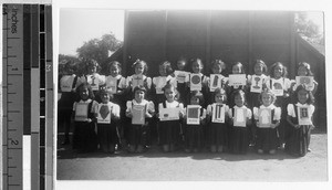 St. Anthony's School second graders holding mass cards, Kalihi, Honolulu, Hawaii, 1948