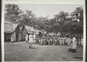 Rev. Ramseyer preaching in the open air in Abetifi