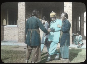 Elderly woman being supported by nurses, China, ca.1917-1923