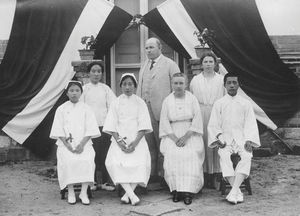 Dr. N. Nielsen, Ms. Kirstine Nielsen and Miss Anna Busch with the newly gradated nurses. The pi