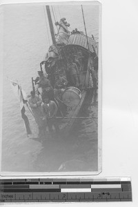 Fr. Paulhus with students on a boat at Yangjiang, China, 1923