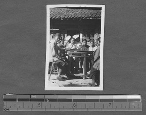 Scientists examining parasites, Sichuan, China, ca.1920-1930