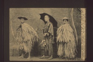 No. 693. A group of Street Coolies. - The first and last are clad with straw rain coats, while the one in the centre