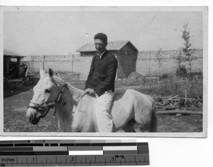 Fr. Kupfer on a horse at Wuzhou, China, 1935