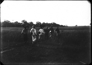 Swiss missionary and African carriers, southern Africa, ca. 1880-1914