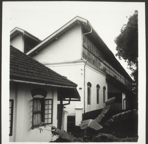 Part of the book-binding shop and the printing press. Entrance for deliveries