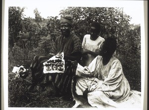 Cameroon, Grassfields. An embroiderer in Fumban