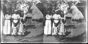 African women and girls standing in front of a hut, Valdezia, South Africa