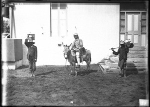 European man on a donkey, Khovo, Maputo, Mozambique