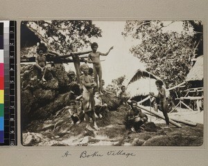 Group of indigenous men in village, Boku, Papua New Guinea, ca. 1908-1910