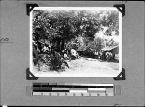 A group of people gathering outside, Ndembo, Tanzania, 1935